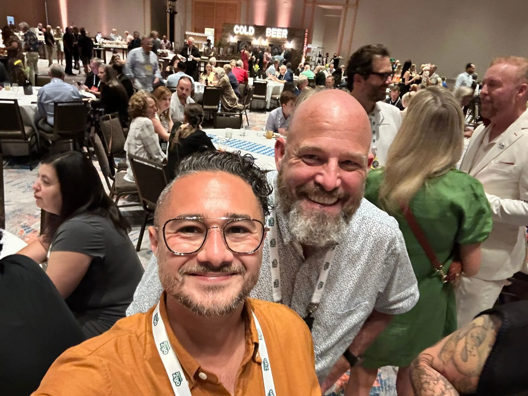 Johnny Tellez at a franchise industry conference, engaging with peers and potential partners.